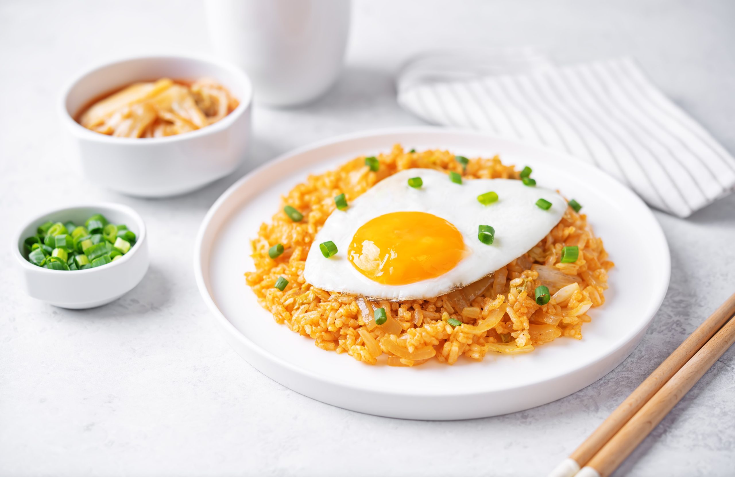 Kimchi,Fried,Rice,With,Fried,Egg,And,Scallion,Sprinkle.,Toning Kimchi Fired rice